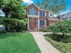 Step into space, style, and comfort with this expansive 5-bedroom, 2.5-bath center-hall Colonial, perfectly positioned mid-block on a quiet residential street. Built in 2005, this beautifully maintained home offers an abundance of room for both everyday living and entertaining.The layout is generous and thoughtfully designed, featuring large, sunlit rooms, elegant decorative moldings, and a seamless flow throughout. The granite eat-in kitchen is a true centerpiece, offering both beauty and function. A stunning chandelier serves as a striking focal point, adding elegance and character to the homeâ€™s refined atmosphere.Upstairs, you&rsquo;ll find five full-sized bedroomsâ€”ideal for those seeking maximum flexibility for living, working, or hostingâ€”while the 2.5 bathrooms ensure convenience and privacy for all. The home is finished with hardwood and ceramic tile flooring, two-zone central air conditioning, and a private PVC-fenced yard with an in-ground sprinkler system.The backyard is spacious and invitingâ€”perfect for outdoor entertaining, weekend lounging, or quiet enjoyment. Additional features include an attached 1-car garage, offering both convenience and storage.Ideally located near major public transportation, shopping, and dining, this home provides exceptional space, style, and convenience all in one. Donâ€™t miss this opportunity to own a spacious, move-in ready home that checks every box!