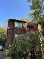 Welcome to this beautiful townhome in the heart of the Catskills, located in The Woods at Davos, a unique community offering a blend of contemporary design and rustic charm without HOA fees. Home features 3 levels. On the main level is a kitchen, dining room, living room with a wood burning fireplace and a half bathroom for continence. 2nd floor has 2 master bedrooms with full bathrooms. There is also a full basement for the bonus space with an one additional bedroom, bathroom and hobby room. Outside amenities include a spacious deck to enjoy private back yard. Conveniently situated just 2 hours from NYC and moments from major highways, this home is the perfect for the year round, vacation or investment and those seeking famous Catskills attractions like Bethel Woods Center for the Arts, Resorts World Catskills Casino, Kartrite Indoor Waterpark and Holiday Mountain Ski & Fun Park.