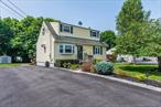 Welcome to this beautifully maintained Cape Cod-style home offering 4 spacious bedrooms and 2 full bathrooms, perfect for growing families or those seeking flexible living space. Step inside to find a warm and inviting layout with sun-filled rooms and hardwood floors. The main level features a bright living room, a kitchen with ample cabinetry and modern appliances. Two bedrooms and a full bathroom on the first floor provide convenient single-level living or ideal work-from-home options. Upstairs, youâ€™ll find two additional generously sized bedrooms and a second full bathroom, offering comfort and privacy for family or guests. The home also includes a partially finished basement, perfect for a playroom, home office, gym, or media roomâ€”plus additional storage and laundry space. Outside, enjoy a peaceful backyard ideal for entertaining, gardening, or relaxing. Additional features include off-street parking and a location close to schools, parks, and shopping. Donâ€™t miss the opportunity to make this classic Cape your forever home!