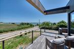 Custom built contemporary home on coveted Narrow River Road in Orient. Unparalleled panoramic views of Peters Neck, Orient Harbor, Orient State Park and Long Beach. Three bedrooms, 3.5 baths, media room, office, open common space, gourmet kitchen, upper and lower water view decks.