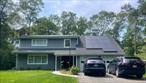 Beautiful move in ready home at end of cul-de-sac in the coveted Brookhaven Hamlet. Fully remodeled in 2018. First floor features a foyer leading you through French doors into formal living room with wood burning fireplace, formal dining room, gourmet eat in kitchen, family room/den and powder room. Second floor features large master suite with master bath, large walk-in closet with separate cedar closet. 3 additional bedrooms and second full hallway bath. Home includes, full basement, 2 car garage, back deck leading to large private yard, in ground sprinklers, security system new cesspool and a fully fenced yard. All this and Marina/Boating Rights, the Great South Bay, local farms, nature preserves and just a short distance to Bellport Village and Patchogue Villages. Recent improvements in 2024/2025 include New Solar Panels, 200 Amp electric service, New refrigerator, Ring door bell & cameras, Keyless entry, Nest Thermostat, Smart Lighting Inside and out + upgraded Lawn sprinkler system & control box.