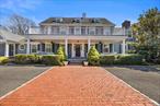Back Lawrence, Five Towns â€“ Long IslandSituated on nearly an acre in one of the most sought-after neighborhoods, this expansive 8, 000+ SF estate features 8 bedrooms, 8 bathrooms, a pool, in-house sauna, and a private ballroom.Designed for the ultimate 0living and entertaining, the kitchen is among the largest on the marketâ€”boasting 4 ovens, 2 refrigerators, 3 sinks, and top-of-the-line Wolf appliances across 3 oversized islands.One-of-a-kind, this home includes a private event room with a built-in wet bar and buffet, seamlessly flowing into a marble-floored dance roomâ€”perfect for hosting unforgettable celebrations.Every mechanical system has been upgraded for durability and efficiency, including a full-home generator, 2 heating systems, 4 central AC units, the latest pool heating technology, and a rooftop solar system for enhanced energy efficiencyA spacious side yard and tranquil setting in prestigious Back Lawrence complete this rare offering.