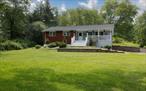 Welcome to your dream home in the picturesque Town of Goshen, just a short 2 minute drive from the historic village! This beautifully maintained ranch-style residence offers 3 spacious bedrooms and 3 full bathrooms, perfectly nestled on 1.4 acres of lush, private land. Just minutes from the scenic Heritage Trail, Legoland, and the convenience of Woodbury Commons Shopping Center, this home blends tranquility with accessibility. Take a look inside to discover a bright and open living room, ideal for both everyday living and entertaining. The expansive living areas are complemented by abundant storage throughout the home. The fully finished lower level, adding an additional 660 sq ft of living space, features a large bonus room with its own full bath â€” perfect for guests, a home office, gym, or additional living space. This home also features a new roof (2024), updated HVAC system just 5 years old, newer septic system (10 yrs old), new pressure tank in well system (2024), new well pipe line (2025), and solar energy. Home is also equipped with a generator hook up. Outside, enjoy the ultimate backyard oasis: a stunning stone patio that spans the entire length of the home, a cozy fire pit for starry nights, and a solid wood pergola offering shade and style. With nearly an acres and a half of peaceful surroundings, thereâ€™s room to roam, relax, and truly enjoy nature.Donâ€™t miss this rare opportunity to own a slice of serenity just moments from the best of Goshen!