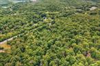 Highway exposure and easily accessible, this 4.7-acre commercially zoned parcel with 480+ feet of frontage along Route 299 in Highland, New York (16, 535 AADT). Zoned DB (Design Business). Conveniently situated approximately 7 minutes / 3.2 miles from the New York State Thruway (Interstate 87).