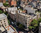 Penthouse in a vibrant neighborhood. Entire top floor with private rooftop terrace. Private elevator. No interior access. Sold occupied with non-paying tenants. Sold AS-IS.