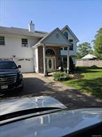 Must-see 4-bed, 3-bath home designed for both comfort and entertaining! Enjoy an open layout with high ceilings and abundant natural light. The main level features a living room, formal dining room, and a modern kitchen with an eat-in nook and stainless steel appliances. The spacious primary suite offers an en-suite bath and walk-in closet. Additional features include a dedicated laundry room, a 2-car garage, an impressive 8-car driveway, and a large yard with both a deck and a patio. Perfect for the modern buyer!