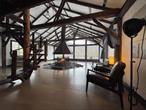 Elegantly designed this classy Catskills retreat sits directly on the Beaverkill in Trout Town, Roscoe- The great spot for fly fishing! Grand, Innovative and One of a kind designs - Large sprawling ranch. Highlights include an indoor 5-car garage perfect for collectors, the most Massive and Unique custom-engineered INDOOR FIRE PIT and a dramatic spiral staircase leading to the loft. Spacious bedrooms, a private-entry primary suite, and a well-appointed eat-in kitchen offer comfort and style. The high-ceiling basement provides expansion potential. Sold in as-is condition. *Sale is &rsquo;as is condition&rsquo; 2 hours from NYC , 30 minutes to Resorts World Catskills and The Kartrite Indoor Waterpark.A refined escape nestled in the woods â€” perfect for a family weekend getaway or a full-time home.*Renovated with all new mechanicals.