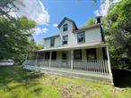 Four bedroom, two bathroom Farmhouse on almost 3 acres in Sloatsburg! Stone fireplace, hardwood floors and sunroom provide appealing country charm. Detached three car garage - great potential for enthusiasts of all kind. Rocking chair front porch, original built-ins, plenty of room inside and out for gatherings and entertaining. Amazing walk-up attic. Close to shopping, schools and amenities.  Sold as-is. Buyer to pay NYS and any local transfer taxes. Offers with financing must be accompanied by pre-qual letter; cash offers with proof of funds. **Please see agent remarks for access, showing instructions and offer presentation remarks.**