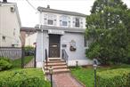 Spacious and versatile, this extended 6-bedroom home is ideally situated in the heart of Jamaica Hills. Designed with a mother-daughter layout, it offers generous living space and hardwood floors throughout. The first floor features a grand foyer, a large living room, an eat-in kitchen with access to a beautifully landscaped backyard, three bedrooms, a full bathroom, and ample closet space. Upstairs, youâ€™ll find two additional bedrooms, a second kitchen, and a full bathroom, along with stairs leading to a full attic loft spanning the entire house. The finished basementâ€”with its own private entranceâ€”includes a bedroom, full bathroom, kitchen, living room, and boiler room. The property also offers a private driveway and one-car garage. Conveniently located near St. Johnâ€™s University, Union Turnpike, shopping, and public transportation.