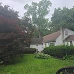 Drive by and see this fixer upper short sale on this beautiful quite street. Sold as is. Location, Location. Location is the key to this one.Above ground oil tank and two unused below ground oil tanks.