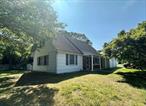 Welcome to this classic Cape-style home situated on a spacious 0.39-acre corner lot in a peaceful cul-de-sac. With four generously sized bedrooms and two full baths, this home offers a flexible layout perfect for a variety of living arrangements. Two bedrooms and one full bath are conveniently located on the first floor, ideal for guests or single-level living, while the remaining two bedrooms and an additional full bath are upstairs.Enjoy the cozy living room, a den with sliding glass doors that can easily function as a family room, home office, or even a fifth bedroom. The eat-in kitchen offers great potential for customization and updating to suit your style. Additional features include a two-car garage, natural gas heating, and public sewers.This home offers excellent bones and layout, just waiting for your personal touch and a little TLC to bring out its full potential. Don&rsquo;t miss the opportunity to make this gem your own! Being Sold As-Is