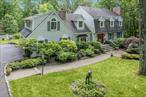 Sprawling colonial where tranquility meets sophistication. Imagine spending the summer relaxing or entertaining poolside on this stone patio, set on over 2 acres of rolling landscape with mature gardens, all surrounded by protected land. The interior opens to a generous foyer, a formal living room w/fireplace, formal dining room and large sunken family room with custom woodworking, a fireplace and wet bar. The kitchen is equipped with high end appliances, granite countertops, a breakfast nook, and includes sliders to a large deck. 4 bedrooms are located on the second floor. The primary suite has a fireplace, ensuite bath, and generous closet space; w/d conveniently located down the upstairs hall. Vaulted ceilings and lots of windows fill the game room with abundant natural light, and add architectural interest to the space. A total of 3700 square ft of living space completes the main living quarters. The lower level features an additional 1100 square foot of living space with a legal kitchen, playroom, full bath and separate washer/dryer. Located at the end of a cul-de-sac, convenient access to highways, parks, trains and shopping in multiple neighboring towns. Bedford Schools. A must see to truly appreciate all that this listing has to offer!