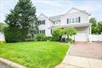 WOW, WOW, WOW - This Spectacular 5 Bedroom / 3.5 Bathroom Colonial sits in the Heart of Merrick. Highlights Include: Gas Cooking & Heating, Gas Burner 4 years young, 200AMP electric, Central Air, Gleaming Hardwood Flooring, Inground Sprinklers, Fully PVC Fenced in Yard, 1 Car Attached Garage, Partially Finished Basement, Storage Galore & Pull Down Staircase Attic, Very Large Bedrooms, 1st Floor Bedroom Has Sound Proofing - Great for Musician, Cathedral Ceiling with Skylights, Washer/Dryer (Laundry Room) on 2nd Floor & Much Much More. Accessible to all. An Absolute Must See. Shed is a gift.