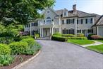 The pinnacle of Modern Colonial elegance in Pound Ridge: timelessclassicism elevated to a grand scale, featuring spacious rooms, prestigeamenities and luxury finishes crafted for contemporary comfort. Set on 3.7acres on exclusive Great Hill Farms Road, itâ€™s minutes from both BedfordVillage and Stamford and an hour to Manhattan. Sunlight streams through the double-height entry, illuminating marblefloors, custom paneling, and striking contemporary chandelier. The formalliving room with wood-burning fireplace, exquisite millwork and Frenchdoors to a terrace opens to a sunroom wrapped in windows. A large dining room also offers French doors to the private patio. The chefâ€™skitchen dazzles with dramatic lighting, custom banquette and top-tier Wolfrange and Thermador refrigerator which is open to the family room with a beautiful stone fireplace. Upstairs, the luxurious primary suiteboasts twin sets of French doors leading to a balcony, two spa-qualitybaths, and dual custom dressing rooms. Two additional ensuite bedrooms and two other bedrooms that share a bath complete the upper level. The lower level offers everything for full-on recreation: a glass-enclosed gym, cinema room, family room, guest suite, wine cellar and full bar. Outside is a resort style escape offering spectacular landscaping, inviting pool and charming pool house and bocce court offering relaxation and recreation. This Pound Ridge paradise, with easy access to the Merritt and684, is a rare fusion of heritage home and private luxury resort.
