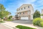 Welcome to your dream waterfront retreat! Nestled in the heart of Freeport Village just moments from the vibrant Nautical Mile, this beautifully elevated Colonial offers breathtaking Baldwin Harbor views from nearly every room and is just a short boat ride to the Jones Beach Inlet. Built raised to FEMA standards with low flood insurance, this meticulously maintained 4-bedroom, 2.5-bath home combines peace of mind with the best of coastal living..Inside, radiant heat flows throughout, ensuring comfort year-round. The expansive eat-in kitchen and oversized dining area are ideal for entertaining, all framed by Western-facing windows that fill the home with natural light and showcase spectacular sunsets over the water. The living room features soaring ceilings, while the heated sunroom invites you to relax and unwind as you take in the serene views.The second floor hosts spacious bedrooms, including a luxurious primary suite with a full en-suite bath. Laundry area located on second floor. A convenient half bath is located on the main level. Downstairs, the walk-out lower level includes a two-car garage and abundant storage space, making organization effortless.Boaters and water lovers will appreciate the 50 feet of newer vinyl bulkheading (less than 10 years old), providing secure and durable waterfront access.Donâ€™t miss this rare opportunity to enjoy the best of bayfront living with comfort, style, and unbeatable viewsâ€”just minutes from dining, beaches, and boating.