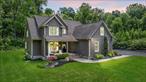 GORGEOUS CUSTOM COLONIAL BUILT IN 2016! Situated on a private cul de sac, this stunning 3, 063 square foot home sits on 1.9 acres, and features 4 bedrooms, 2 1/2 baths, a second floor bonus room AND separate office/den above the 2-car garage (with BRAND NEW EPOXY FLOORING), as well as a fabulous back patio entertainment area with a covered deck with big screen TV, which steps down to an uncovered patio area with a built-in gas grill, stand-alone fireplace, and an above-ground pool . . . and finally, a full unfinished basement with 9-foot ceilings ripe for finishing! And that&rsquo;s just for starters! The owner is a builder who built this home for his family -- and it shows! Curb appeal galore as you pull in the driveway and walk up to the stone paver patio. Enter to an open floorplan with gleaming hardwood floors, and a living room featuring cathedral ceilings and a gas fireplace with the stone chimney extending all the way up, along with sliders to the back deck/patio area. An open kitchen concept includes stainless steel appliances, beautiful quartz countertops, a breakfast bar, a pantry, and is sandwiched by a formal dining room, as well as an eat-in dining area. This home also feature a main floor en suite with bathroom with soaking tub and stand-up shower and two walk-in closets. Upstairs are three generously-sized bedrooms, not a mention an oversized bonus room which leads into a separate office/den area. The property is well landscaped, and includes a separate drive up to an open area with a pop-up garage tunnel, as well as plenty of space for an RV and any other outdoor equipment, etc. (and this area is completely obscured from the home). Private setting, yet just minutes from the Village of Warwick and all it has to offer, not to mention hiking, skiing, boating, entertainment, fantastic dining options, orchards, Farmers Markets, wineries, breweries, bike/walking trails, drive-in movie, bowling alley, schools, library, hospital, and so much more. This home and property has everything you need -- just move right in and unpack!