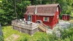 108+/- acres with a chic streamfront cabin. This is a large, forested tract of land, with meadows, rushing stream and active beaver ponds. Many trails run throughout the property making it an outdoor enthusiasts paradise.The house has been tastefully remodeled with a modern kitchen, full bath, open living room and 2 bedrooms upstairs. House has been recently painted. The heat and cooling are electric heat pump mini split units. Need storage? A detached oversized two car garage and outbuildings are set around the homesite. Enjoy the stream and view from a large 16x24 deck, and a private T-deck which is right over the water. A true Catskills getaway, enjoy this private outdoor complex, only 4 miles to the Delaware River and 15 minute drive to Callicoon, New York.