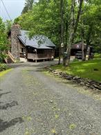 Escape the hustle and bustle of city life with this serene and secluded cabin, perfectly nestled in the woods at the end of a quiet dead-end road. Just a short 2-hour drive from New York City, this peaceful getaway offers the ultimate in privacy and relaxation.Whether you&rsquo;re sipping coffee by the fireplace or enjoying the surrounding nature on one of the porches, this cabin offers a warm, welcoming atmosphere that feels like home. With direct access to New York State land, outdoor enthusiasts will love the hiking, wildlife, and endless natural beauty right at their doorstep.This turn-key property also presents a fantastic short term rental opportunity, with its desirable location, cozy charm, and peaceful setting that travelers seek.Don&rsquo;t miss your chance to own a slice of upstate paradise!Call now for your private viewing.