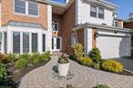 You will be AMAZED by this one of a kind, custom designed townhouse with lake & triple fairway views in The Hamlet Golf and Country Club of Commack! Welcome to luxury living at its finest in this custom designed home perfectly positioned within a gated community on a premium lot with unobstructed views of the triple fairways and small lake with a fountain.What will your family and friends talk about the most?  The views, the entrance, the grand living room, the detailed dining room, the chef&rsquo;s kitchen, the sauna, the primary suite, the glass office, the fireplace, the ensuites, the backyard?Large, beautiful windows front and back creates a sun-drenched grand entrance with soaring ceilings to the second floor. Relax in the well lit den with a 3-sided gas fireplace that you will enjoy from the den, the entrance way, and the grand living room. The Grand living room features custom molding, custom beams, large, full wall windows with beautiful view of the patio and fairways, and a soaring 2 story ceiling with recessed lighting to create light even when the sun goes down. The living room flows to both the outside patio and the formal dining room. The formal dining room features custom built-ins and molding and opens to the gourmet, eat-in kitchen. This kitchen is a chefâ€™s and baker&rsquo;s dream, complete with professional-grade appliances, a double gas oven and a double gas range, a center island, a breakfast bar, 2 wine refrigerators and more stunning views of the course.Each of the three spacious bedrooms includes its own ensuite bath. The main suite is a serene retreat. Awake to panoramic views of the golf course and a small lake with a fountain through a large bay window which includes a built-in bench. A sitting area to enjoy the views, an office with a full glass wall provides an inspiring workspace overlooking the greens. The suite also features a dedicated makeup area, two large entry closets, and a luxurious spa-like bathroom with a SAUNA, steam shower, deep soaker tub, and dual sinks. This is the perfect space to start and end your day.Experience outdoor living at its finest in this beautifully landscaped backyard, perfectly positioned on the golf course with open views of the triple fairway and a small lake with a fountain. A perfect space for entertaining and relaxation. Enjoy the expansive brick patio, featuring an outdoor kitchen and built in bar with seatingâ€”ideal for dining, relaxing and entertaining.An artificial grass area offers space for play, pets, or peaceful lounging, all framed by the natural beauty of the triple fairway and shimmering water. Whether hosting guests or unwinding with a morning coffee or tea, this private outdoor retreat delivers tranquility, luxury, and a front-row seat to the best views in the community.The Hamlet is a gated county club community that features a championship golf course designed by Stephen Kay along with a great pro shop it is sure to please all golfers.Enjoy an amazing culinary journey with a world class cuisine and choose between dining indoors or outdoors at The Empire Grille.The outdoor tennis facility offers 8 courts: 6 hard courts and 2 Har-Tru courts. 6 Pickleball courts and the facility is lit for nighttime play as well as daytime play.Take a dip in the heated pool, watch the kids in the kiddie pool, relax on the expansive pool deck, enjoy a refreshing beverage or cocktail from the cabana bar and get lunch or a snack also.The comprehensive workout facility also offers classes in Zumba, yoga, water aerobics, and Pilates.Play cards with friends or enjoy the many activities offered.You have the opportunity to have 5 friends join you at the wine cellar for a 5 course meal prepared for you by the executive chef.Personal wine lockers allow a safe and convenient way for you to store your favorite wines.Living at 62 Hamlet Drive is like being on vacation everyday. This is more than a home, it is a lifestyle!