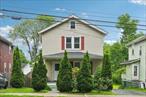 A spacious home that is ideally located less than a mile from the Peekskill Metro North, Route 9, parks, restaurants and local schools. Enjoy ample private parking on your driveway that easily holds up to 10 cars. Idyllic covered porch. Living room and formal dining room feature ample natural light. The kitchen is appointed with stainless-steel appliances.1st floor primary bedroom with ensuite primary bathroom. 3 more spacious bedrooms. 2nd floor office can be used as a den, guest space, or nursery. 2nd floor hall bathroom completes this home. Outside you will find a large deck overlooking the fenced-in and level backyard. Some images are virtually staged. This home is registered with the 100% Money Back Guarantee. Sold AS IS