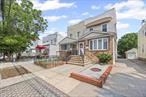 Welcome to this exquisite legal two-family residence in the heart of Briarwood, Queens. This beautiful brick semi-detached home offers an expansive 2, 290 square feet of living space, perfectly situated on a 2, 300 square foot lot. As you step inside, a welcoming foyer introduces you to the spacious first-floor apartment. Here, high ceilings and an open layout concept create an airy ambiance, complemented by an updated kitchen and bathroom. A charming bay window and elegant wood floors enhance the appeal of the living area. On the second floor, discover a well-appointed two-bedroom layout that easily converts to three bedrooms, featuring a skylight that bathes the space in natural light. Additionally, a full finished basement with an outside entrance offers extra living or storage space. The home boasts convenient amenities including baseboard heating, gas heat, and common outdoor space. A long driveway accommodates up to four cars, and the southeast exposure invites ample sunlight throughout the day. This meticulously maintained property is close to shopping, worship, public transportation, and major highways, making it a prime choice for elegant urban living.