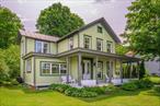 Set amongst the other historic homes in the Hudson River hamlet of Stuyvesant, NY on Riverview Street, named after the 1st director-general of New Netherlands&rsquo; Dutch Colony in 1647, where it seems time has stood still, this residence offers the perfect country setting and panoramic river views anyone could possibly want. This exquisite 1880 farmhouse features 1, 600 sq. ft. of impeccably restored original details such as; wide plank wood floors, high ceilings, double sided fireplace with hand-carved wood mantels, banister, doors and crown moldings married with a modern gourmet eat-in kitchen, new bathrooms and central AC. The 2nd floor features a center hallway that flows perfectly to 3 bedrooms, a full bathroom and the most peaceful front sitting area. The entire house is flooded with natural light reflecting off the majestic Hudson River and the hills of Greene County, across the water, off in the distance. Enjoy relaxing on the long front porch, the ideal spot for a summer nap, enjoy a drink, read a book or just sit and be mesmerized by the passing ships. Then, end each day seeing the most beautiful sunsets ever! The dining room flows seamlessly outside to a back porch and terraced garden where you can entertain and dine al fresco with your family and friends all summer long. Rarely does a house of this quality and location come on the market, a true farmhouse gem, facing the Hudson River and close to all that Columbia County has to offer. Hudson&rsquo;s Warren St/Amtrak Station; 20 mins, Kinderhook;10 mins, Boston/NYC; 2.5 hours and Albany; 30mins away.