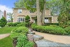 Welcome to this stunning, extended and beautifully updated Center Hall Colonial with 4 bedrooms on one level; ideally and majestically located mid-block, elevated and set back from the road on one of the most picturesque streets. Nestled within the coveted Plainview-Old Bethpage School District and around the block from the Greenbelt hiking and biking trail, this expansive home offers well over 3, 000 square feet of thoughtfully designed space, blending classic charm with contemporary living. Step inside to a gracious layout featuring a living room with a window seat, dining room, a cozy family room with a wood-burning fireplace, and an expansive, open-concept kitchen that is truly the heart of the home. The gourmet cooks&rsquo; kitchen boasts Quartzite countertops, stainless steel appliances, gas cooktop, built-in electric grill, island seating, and an adjoining 40 foot all-season breakfast room with floor-to-ceiling windows; perfect for entertaining and everyday living. The side entrance connects to the main level laundry/mudroom, opening to an oversized two-car garage with additional storage. Upstairs, are 4 generously sized bedrooms, including a king primary suite with a walk-in-closet and updated ensuite, windowed full bath. Three additional queen bedrooms and windowed hall bath offer abundant natural light and privacy, with a large upstairs landing providing ideal separation of space. The finished basement offers tremendous versatility, perfect for a den, playroom, home office and guest space; along with expansive storage and extensive bonus space. Enjoy outdoor entertaining with a multi-level deck complete with counter space for grilling, and wooded views offering abundant privacy; fully fenced, and close to park with tennis, playground and pickleball; gas heat, 2 gas hot water heaters, 200 amp electric, underground sprinklers, 5 car+ driveway; A rare find, not to be missed.