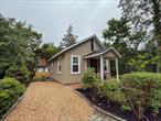 This beautifully appointed Sea Cliff bungalow offers a cozy yet airy retreat, brimming with character and thoughtful updates. Sunlight pours through large windows and three skylights, highlighting gleaming wood floors and creating a warm, welcoming atmosphere. In addition to the bedroom on the ground floor, there is a sleeping loft which features two large windows, a skylight and two large closets. The renovated full bath adds modern comfort, while the dining area offers window to a lush open land. Outside you will find a tranquil garden oasis surrounded by bamboo fencing. A blue stone patio invites al fresco dining and relaxation, while blooming hydrangeas and rose bushes line a charming brick walkway. Additional features include two-car parking driveway and an electric car charger for Eco-conscious convenience. Ideally located in town, you are just moments away from a vibrant art/music scene, innovative dining, adults & childrenâ€™s library,  beach rights and unforgettable sunsets. This bungalow offers the best of small-town charm with modern amenities, an idyllic year-round residence or weekend getaway.