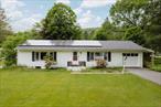 This Western Catskills ranch home provides lots of great living space, including a sizable room with en-suite half bath and its own exterior entrance - suitable as fourth bedroom, but with potential for much more. From the front door, enter the large and light-filled living room that flows seamlessly to dining area and kitchen. Off the main living space youâ€™ll find the spacious primary bedroom with walk-in closet and large en-suite bathroom. Two bedrooms sit at the far end of the hallway; one with en-suite half bath. An additional full bath is accessed from the hallway. At the rear of the house is a large (26â€™ x 16â€™ approx.) and versatile room with an en-suite half bath and closet, plus an exterior entrance in addition to access from the main house via an internal vestibule. This generous suite presents many opportunities as itâ€™s suitable for use as a fourth bedroom, accommodation for an in-law, health aid or nanny, as well as a home office or creative studio. Alternatively, the space could be used as a professional office, or as workspace for a health & wellness, beauty, or other home-based business (subject to any relevant permits being obtained). There is room to park multiple vehicles outside on the paved driveway and parking strip along Rockland Road. The basement level has good ceiling height and potential to provide additional living, storage, workshop, or studio space, etc. A lounge area with stone fireplace is partially finished. There is also a laundry area, and a large unfinished storage space. Outside, an expansive, tree-shaded deck (27â€™ x 24â€™ approx.), accessed via patio door from dining area, affords opportunities for outdoor cooking, dining, evening gatherings around the fire pit, or quiet relaxation. The large and level yard beyond provides ample space for gardening and recreation. A garden shed, adjoining the rear of the house, can be used to store outdoor gear, tools, etc. A loft above, accessible via ladder, could make a fun hangout place for kids. Conveniently located near the increasingly popular towns of Roscoe (5 minutes) and Livingston Manor (10 minutes) that feature a variety of stores, restaurants, bars, plus breweries, a distillery, and the Catskill Art Space. Great for access to nearby golf courses, hiking trails, and fly fishing on the areaâ€™s renowned trout-fishing streams - the Beaverkill and Willowemoc. Approximately two hours from GWB and NYC. Additional Information: The home is located in a flood plain; the seller currently pays approximately $1, 938 a year for flood insurance. Solar panels on the roof are owned and transfer with the sale of the house.