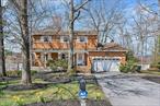 This thoughtfully cared-for Colonial sits in the heart of South Blooming Grove, surrounded by mature trees and lush landscaping that offer both privacy and curb appeal.A welcoming front deck leads into a spacious foyer, opening to a large living room, formal dining area, bright kitchen, and a cozy family room complete with a fireplaceâ€”perfect for gathering in every season.Upstairs features four well-proportioned bedrooms, including a generous primary suite with plenty of closet space and a private en-suite bath. The basement, while unfinished, has been creatively transformed into a playful, functional space ideal for kids.The fully fenced backyard is built for outdoor living, offering expansive views, storage sheds, and a unique multi-level deck with three connected platformsâ€”great for entertaining, relaxing, or hosting under the open sky. A side entrance and attached garage add convenience and functionality.This home is ready to welcome its next chapter.Come see it in person and discover the lifestyle waiting for you.