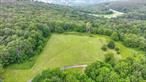 49 beautiful acres of land set in a private, serene area with a pond perfect for swimming, fishing, and boating. Make this dream location your forever home. Beautiful mountains surround the area.  Bush School District. Great commuter location just under 10 minutes to Route 17. Close to Resorts World Catskill Casino, Legoland, local wineries and breweries. Wurtsboro offers Coffee Way Cafe, Layla&rsquo;s restaurant, and Pasta Doro.