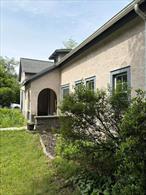 Step inside this lovely Mediterranean French provincial textured stucco/ stone ranch style 1930â€™s home with three bedrooms, two full baths, full attic (ideal for a master suite or family playroom), full basement. Hardwood floors throughout. Original woodwork with built ins. Kitchen has been upgraded but they kept the original Butlers pantry with tons of cabinet space. French doors entering formal dining room with built in corner china cabinet. Imagine yourself relaxing by the woodstove surrounded by stone making the room so cozy,  on those chilly nights enjoy your cup of hot tea/coffee/wine as you watch your favorite Show or cuddle up reading your favorite book. Deck is entirely private, it overlooks a large field with surrounding mountain views. Not wanting a lot of lawn to maintain well this lawn is small and has lovely flowers gardens around the base of the house. Walk to town to shop, enjoy the eateries, or stop by Do Good Distillery to listen to live music as you enjoy cocktails and a bite to eat. There are so many eateries to choose from in our grand little town.  Close to Bethel Woods (where the original Woodstock concert took place in 1969), Kartrite Indoor Water Park, Resorts Casino,  Villa Roma, Holiday Mountain, Roscoe Mountain House, Open outdoor concerts, Farmerâ€™s Markets, Antiquing, wineries, Breweries, state parks, state lands for hiking and hunting. The secret is outâ€¦ the Catskills is the place to be!