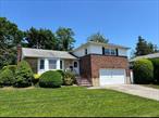 King Size Spacious & Gracious Barnum Woods Brick Split In Prime Area, Quied Dead-End block Prestigious Barnum Woods area. A rare 4-bedroom split at an affordable price. Oil/HW Heating. In-Ground Sprinklers, 5 Air-Conditioners. New electric in 2025. Priced For FAST Sale!