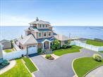 Welcome to a rare slice of waterfront paradise on the Great South Bay, where the beach and the water are your closest neighbors and the views stretch endlessly in every direction. This elevated, contemporary beach-style residence is thoughtfully designed to capture the natural beauty of its surroundings while delivering the finest in coastal luxury. Nestled beside a pristine, untouched stretch of beach to the west, this sun-illuminated home is perfectly positioned with full east-to-west exposureâ€”allowing you to savor both sweet sunrises and breathtaking sunsets. Gaze southward across the shimmering water to the silhouettes of Fire Island, while every room offers sweeping, uninterrupted vistas of the bay. Inside, rich Brazilian cherry hardwood flooring flows throughout, adding warmth and sophistication to the open, airy layout. The chefâ€™s kitchen is a statement in refined craftsmanship with a French country flair, featuring buttercream cabinetry with detailed molding, a double-sized Sub-Zero refrigerator, six-burner Wolf range â€”designed for entertaining and everyday luxury. The homes primary suite mirrors the tranquility of a yachts stateroom- featuring private balcony access, spa inspired bath, and sweeping views from every angle. Step outside to 200 feet of your own navy-grade bulkheaded waterfront, complete with a sandy beach, multi-level decking, stone patios, balconies, a cabana, and a built-in fire pitâ€”perfect for long summer evenings by the bay. Tucked away at the end of a quiet, secluded lane, this home offers ultimate privacy and serenity while keeping you connected to the rhythm of the tides. Every detail, from the coastal palette to the fluid layout, is crafted to deliver the sensation of being cradled by the sea- without ever leaving home.
