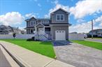 Last Left in this Waterfront New Construction Project! Beautiful Custom Kitchen ft. Oversized Island & New Appliances, Hardwood Floors, Fireplace, Dedicated Laundry Room, Large Master w. Huge Walk in, Vaulted Ceilings + Master Bath, Energy Rated, Home Energy Certified. and Flood Compliant Home, Forced Air HVAC w. 2 zones, Attached Garage. Canal and Boat Access. Too Much to List! Nothing Better than New! Do Not Let This Opportunity Pass You By!