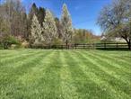 We are thrilled to present an exceptional opportunity to own 10.8 acres of wooded and open land here in the Town of Liberty, NY.  This remarkable property offers endless possibilities, from creating your own private estate to developing a possible future subdivision. The property features an expansive 10.8 acres with some rolling topography, a pond, stream, partially fenced, adorned with ornamental trees, and tons of privacy. With convenient access to the I-86/ Rt. 17 corridor, this property offers multiple entry points; California Avenue and Cold Spring Road. Minutes from Bethel Woods, Resorts World Casino, the Cartwright, local shopping and restaurants. Situated less than 100 miles from NYC, this property is ideal for those seeking a balance between tranquility and local convenience. Immerse yourself in the tranquil beauty of this well cared for property, perfectly situated to provide privacy without sacrificing convenience. Whether you are an investor, developer, or simply seeking a secluded retreat, this opportunity is not to be missed.