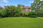 Tons of potential to make this brick center hall colonial ur own on a big corner lot