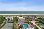 Oceanfront on Dune Road, this updated beach cottage offers over 100 feet of direct ocean frontage and sits on an acre with sweeping views of both the ocean and the bay. The open-concept interior features vaulted ceilings, abundant natural light, and a spacious kitchen with high-end appliances and a large island perfect for entertaining. With 5 bedrooms and 4 full baths, three of which are ensuite, the layout is designed for relaxed coastal living.Step outside to enjoy a private walkway to the beach or unwind by the beautifully designed gunite pool, complete with a surrounding patio and a dedicated cabana for relaxing or hosting. The oversized lot offers exciting potential to expand the existing home or build new on a generous envelope.Additional features include a newer roof and siding, an elevator, a two-car garage, and a convenient laundry area.Set on a prime stretch of Dune Road, this property offers a rare combination of privacy, oceanfront lifestyle, and future potentialâ€”an exceptional opportunity in Westhampton Beach Village.Set on a prime stretch of Dune Road, this property offers a rare combination of privacy, oceanfront lifestyle, and future potentialâ€”an exceptional opportunity in Westhampton Beach Village.