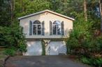 Motivated Seller! Bring your remodeling skills and make this charming 2 bedroom 1 1/2 bath your new home. Sits on 2.79 acres with endless flowers, trees and variety of birds. Entertain your family or friends in the bright spacious living room, or dining room. During the winter months heat the home using either woodstove or pellet stove. Relax and enjoy the natural surrounding under an enclosed gazebo. In addition, a 14 x 70 workshop trailer with electric, providing extra storage. AS IS sale.