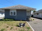 Two-Family Home on 40x100 lot. 1 Bedroom Apartment in Front of House; 2 Bedroom Apartment in Back of House. Both Tenants will be vacating in July. Please do not walk the property without an appointment.