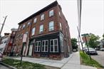Three unit townhome for sale, with parking and laundry! All units recently renovated, and sidewalk updated to streetscape standards. Nice tenants in good standing, with one unit available to remain vacant as needed for an owner-occupant. A great opportunity to enjoy market rate income and a low-hassle investment property in the City of Newburgh!