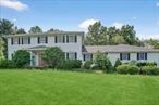 This expansive Colonial home offers over 3, 200+ sq ft of beautifully maintained living space, nestled on a peaceful 1.80-acre lot in the sought-after Rock Tavern area of New Windsor! Lovingly cared for and on the market for the first time, this home blends charm, comfort, and functional living â€” perfect for everyday enjoyment or entertaining guests. Large Living Room with French doors leading to a formal dining room with beaming hardwood flooring and chair rail with a separate door that leads to a spacious country kitchen with gorgeous oak cabinetry, generous granite countertop space and a cozy breakfast nook area! Oversized mudroom with washer/dryer and an abundance of closet space takes you to the large office/bonus room with a private entrance â€” perfect for remote work or a home business! First-floor full bath with a soaking tub that flows into a versatile room with French doors â€” ideal as a first-floor primary suite, den, or guest space! Second Floor offers an additional Primary suite with private full bath and walk-in closet! Three additional generously sized bedrooms, all with ample closet space and carpeting! Full main bath conveniently located off the hallway with tub! Full unfinished basement with room for storage, workshop, or future recreation space! Private well and septic system with water softener! 2 Car garage with handicap ramp and an additional ramp in the back of the house! Oil tanks replaced 5 years ago (in basement) new driveway in the same time period and a 4-year-young roof for peace of mind! Located in the Town of New Windsor, Rock Tavern section; Washingtonville School District! ( Little Britain Elementary; Washingtonville Middle school; High School) Low taxes; Town & County: $3, 839; School:$9514.37; Total: $13, 354 (No STAR exemption applied). This home has everything you need to live, grow, and create new memories. Schedule your showing today â€” your next chapter starts here!