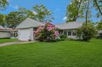 Price Improvement on this UPDATED East Hampton Model in the 55 OR BETTER community of Leisure Knoll! This model boasts a HUGE kitchen with maple cabinets, perfect for storage, dining and displaying needs. The front door was moved forward from the standard floor plan to provide interior access to the garage (and a second double closet). No need to go outside to get into your car! There is also real hardwood floors throughout the entry foyer throughout the Kitchen and Dining Area. Spacious Living area and Bedrooms with lots of closets for storage. 2024 new roof and CAC with Heat Pump (which will reduce your heat expense dramatically)! The windows have been replaced and the siding has also been replaced with vinyl. Stunning bathroom renovation down to the studs featuring tile surround, step-in shower with seat and single sink vanity. Taxes are $6, 386.45 without the basic STAR exemption of $962.57. The community maintains the lawns with weekly cuts, semi-annual fertilization and provides snow removal with 2 of accumulation. Each house maintains their own in-ground sprinklers. This community offers a range of amenities and social activities, including a community center with Heated in-ground Pool, Bocci, Putting Green, Cornhole, Tennis & Pickle Ball courts and a Crafts Center along with other amenities for your enjoyment. Clubhouse is at the end of this street!  Basic Cable package included in the montly maintenance fees.  Quarterly water and sewer