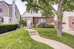 This beautifully maintained two-family home is nestled on a quiet residential block in prime Whitestone. Boasting stunning curb appeal, this property offers the perfect blend of classic charm and functional living. Situated on an extra-long 40x124.25 lot (4, 970 sq ft), this home provides generous space both inside and out. The first floor features a warm and inviting layout, highlighted by rich woodwork, a cozy wood-burning fireplace in the living room, a formal dining room, an eat-in kitchen, bedroom and full bath. Upstairs, the second unit presents an ideal living space with room for a kitchen (room would need to be converted back to a kitchen, all plumbing already in walls), two generously sized bedrooms, a full bath, and a huge open attic that can easily be transformed into a third bedroom, office, or living room. The fully finished basement includes ample storage, a workshop area, and laundry space with washer and dryer, with plenty of room left to customize to your needs. Outdoors, you&rsquo;ll find a private backyard oasis with lush green lawn and plenty of space to garden, entertain, or simply unwind. A private driveway and garage offer rare convenience and additional storage. Located near the Whitestone Shopping Center, schools, dining, and public transportation, this home offers the best of suburban living with easy accessibility. A true must-seeâ€”schedule your private tour today!