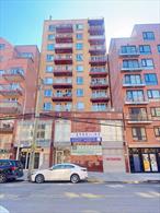Flushing high-rise elevator condo 15 years new building 1B1B with large balcony with washing and drying equipment facing south open kitchen with SS appliance ready to move in.