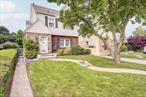 This beautifully maintained home is currently used as a one-family residence, but comes with a legal two-family C of O, offering flexibility for future use or investment potential. Perfectly nestled on a quiet residential block in prime Whitestone and situated on an extra-long 40x124.25 lot (4, 970 sq ft), this home provides generous space both inside and out. Boasting stunning curb appeal, this property offers the perfect blend of classic charm and functional living. The first floor features a warm and inviting layout, highlighted by rich woodwork, a cozy wood-burning fireplace in the living room, a formal dining room, an eat-in kitchen, and full bath. A versatile bedroom/den offers direct access to the private backyard. Upstairs offers three generously sized bedrooms, a full bath, and a huge open attic that can easily be transformed into a fourth bedroom, office, or playroomâ€”a unique bonus! The fully finished basement includes ample storage, a workshop area, and laundry space with washer and dryer, with plenty of room left to customize to your needs. Outdoors, you&rsquo;ll find a private backyard oasis with a lush green lawn and plenty of space to garden, entertain, or simply unwind. A private driveway and garage offer rare convenience and additional storage. Located near the Whitestone Shopping Center, schools, dining, and public transportation, this home offers the best of suburban living with easy accessibility. A true must-seeâ€”schedule your private tour today!