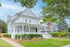 Who wants to be the next owner of this 1910 Charming, Restored, Magnificent Piece of History? Built in only the 10th year of the 20th century - An absolute WOW at first Sight! All Original floors, Wide Moldings, Windows w/New Glazing, Glass and Weight Adjustments, Original Tiled Bathroom floors, Second Floor Balcony, Brick Wood Burning fireplace, Solid Wood Doors.Plus Multiple Swing Doors, Restored Tastefully to New Condition, Complimenting the Remarkable 1900&rsquo;s Design. Original Reestablished Slate Roof, Custom Original Stairs, Leading to All Levels. Astounding Built-Ins Throughout-Truly Captivating Main Entry Stairs w/Newel Posts and Balusters, Along w/Stain Glassed Window To Bring in Warmth and Natural Light Through The Foyer .Full Reinstated Wrap Around Covered Porch w/Original Railings, Columns and Cover.Fully Fenced.Brand New Paver Patio .Massive Historic Home featuring 4 Tremendous floors, 5 bedrooms, 3 1/2 baths - 2 Car Detached Garage w/16ft Ceilings, Brand New Extended Asphalt Driveway - All New Plumbing & Electrical 200 Amp Svc- 7 Individual Staircases in the home. A Home You Won&rsquo;t Want to Miss - Prime Location - Minutes to Restaurants, Theatre, Beaches, and Peconic River For Fishing & Boating Surrounded by Wine Country, Local Farms and Tanger Outlet, Splish Splash & More!. Close to LIRR, 3 Mins to Expressway..Just 2 hours from NYC, 1 1/2 to Montauk and Short Distance to Greenport & Orient .Second Floor Has Separate Guest/Maids Quarters w/Access to All 4 Impresssive Floors..House Next Door Was the Original Guest House To This Historic Masterpiece!!! Three Independent Energy Star rated heated and cooling systems -1 per Floor w/ smart thermostat ..All Entrance Doors w/Smart Keypad and Dead Bolts..Low Low Taxes..Run..This One is Going Fast and will be History..House is a commercially Zoned Residential Property suitable for Multi Use..(Potential Professional Office/Business Space and/or Investment , Air BNB or Bed and Breakfast