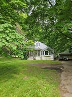 This property is being sold AS IS....... located in close proximity to trails, schools and the village of Red Hook. This project will be well worth your efforts when you end up enjoying backyard life with views of the Catskill. Enter through the side door to the eat in kitchen, large living room, glassed in front porch, large primary, office, and full bath. The 2nd floor has two bedrooms witha large foyer in between.The roof is 15 years old, the septic 10 years old, the furnace 12 years old.Additional photos to follow. Taxes and sq footage to be verified by the buyers agent.Accepted Offer as of 6/24.
