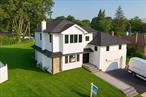This striking 4-bedroom, 3.5-bathroom architectural beauty stands tall in elegance. Renovated by a reputable local builder known for high quality craftsmanship and exquisite design. Located on a private cul-de-sac in highly desirable Salisbury estate section area of Westbury. Open concept features with a 2 story foyer entry. From its impressive fade, to its meticulously crafted interiors, every detail has been thoughtfully executed. Inside, you are greeted by gleaming hardwood floors and 9 ft ceilings that elevate the home&rsquo;s expansive feel. The gourmet kitchen, a centerpiece of the residence, boasts top-of-the-line stainless steel appliances and a spacious quartz island. The sunlit living room seamlessly transitions into a cozy great room, offering ample space for both relaxation and entertainment. The primary suite is a serene haven, complete with two walk-in closets and an ensuite bath.