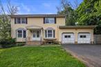 Welcome to 12 Gilles Drive, a cozy colonial on a quiet cul-de-sac in Central Nyack. Step inside to a spacious dining room and a comfortable family room, followed by a warm living room with a fireplace. The kitchen is well-appointed and opens to a nice porch, with a half bath and a private office ideal for working from home. Upstairs, natural light from a skylight fills the hallway leading to four well-sized bedrooms, including a primary suite with a full master bathroom. The finished basement offers even more living space with a second kitchen, full bath, additional bedroom, and a large family roomâ€”perfect for guests or extended family. Set on a nice yard in a peaceful neighborhood, this home features a thoughtful layout, great flow, and a truly convenient locationâ€”just minutes from local restaurants, shops, and the center of town.Donâ€™t miss the chance to make this your next homeâ€”schedule your showing today.